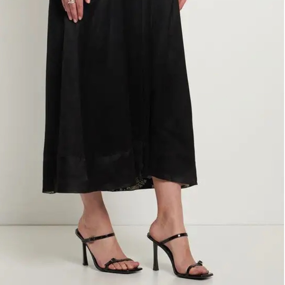 BY FAR
Flick Black Patent Leather Heel 39